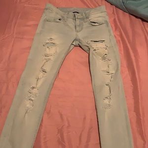 Light jeans from American eagle with rips .